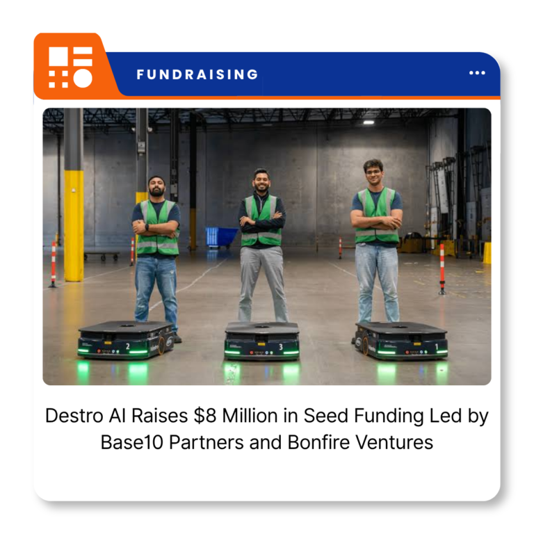 Destro AI branding alongside autonomous robots operating in an enterprise warehouse.